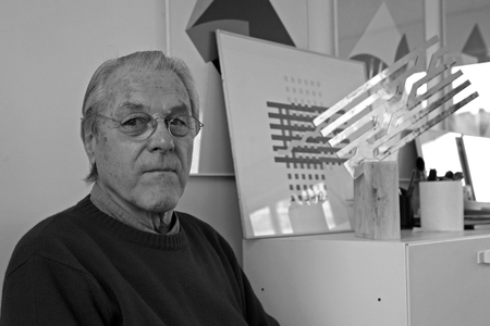 Portrait of Jean Widmer, Swiss graphic designer, in his studio in Paris in 2009.