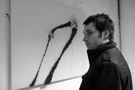 Portrait of Lionel Sabatte, French painter, in his studio of the Pre Saint Gervais in 2008.