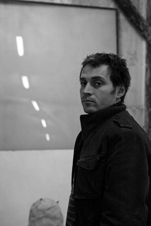 Portrait of Lionel Sabatte, French painter, in his workshop of the Pre Saint Gervais in 2008.