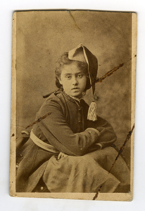 France, Portrait of a young girl in studio dressed in military with a pompom hat, 1870