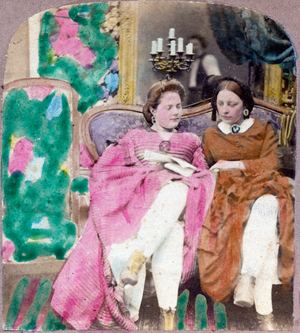 Two young girls on a sofa read letters, 1866