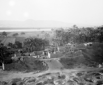 Egypt: Cook cruise on the Nile, a land village on the Nile with crops, palm grove and archeological excavations, 1890