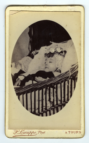 France, Post-mortem portrait of a new born in his cradle, 1875