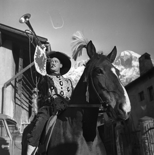Innsbruck: a rider disguise in herald with his trumpet and traditional costume, 1937