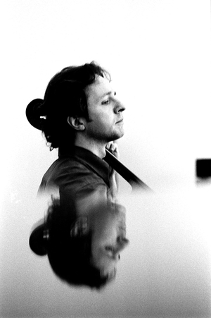 Portrait of Marc Coppey (born 1969) French cellist. Chambery, 2002.