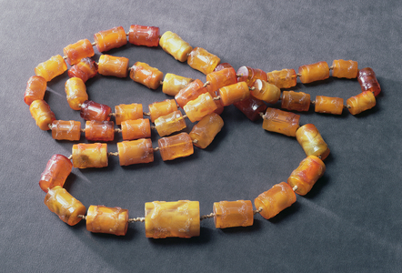 Necklace of 49 cylindrical beads decorated in bas-relief, c.1600 (amber)