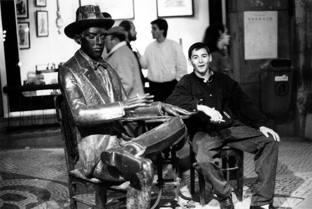 The poet Fernando Pessoa with a young admirer in Lisbon. 1992