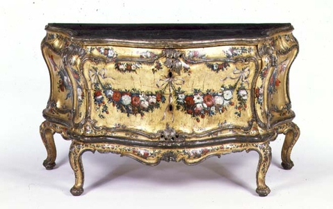 Venetian painted and gilt commode with shaped moulded top decorated to simulate marble, the front with two drawers moulded, shaped and decorated with garlands of ribbon-tied flowers, mid 18th century