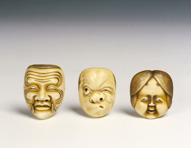 Three masks (ivory)