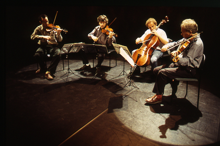 Takacs Quartet - portrait of the string quartet performing, March 2000. Founded in 1975 in Budapest, Hungary. - Edward Dusinberre, first violin - Karoly Schranz, second violin - Geraldine Walther, viola - Andras Fejer, cello