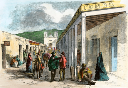 The hotel La Fonda, seen from the square of the city towards the Cathedral of Saint Francis, Santa Fe, New Mexico (USA), around 1860 - Colour engraving 19th century - La Fonda Hotel, looking from the Plaza to St Francis Cathedral, Santa Fe NM, 1860s - Hand-colored woodcut of a 19th-century illustration