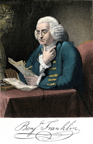 Portrait of Benjamin Franklin (1706-1790) has his desk with signature.
