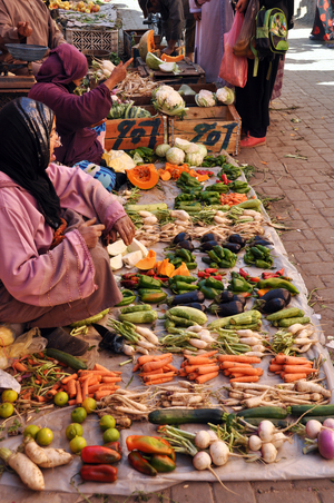 Four Seasons Legume Merchant in a Medina Street in Marrakech, Morocco - walking - Photo Patrice Cartier -