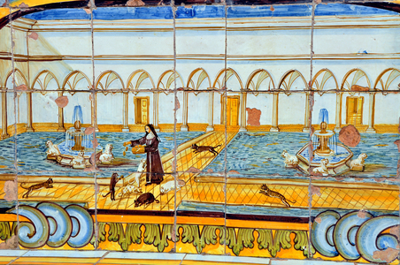 Naples, Italy (Napoli, Italia): chiostro maiolicato, monastero di Santa Chiara - majolic cloitre (of faience) of the monastery of Santa Chiara, mid-18th century - majolic decorees of mythological scenes, landscape and polychrome maritime scenes, due to the ceramists Donato and Giuseppe Monastery Massa - sister clarisse (nun, nun, nun, nun,) nourishing cats in a convent cloister adorned with two fountains - Photo Patrice Cartier -