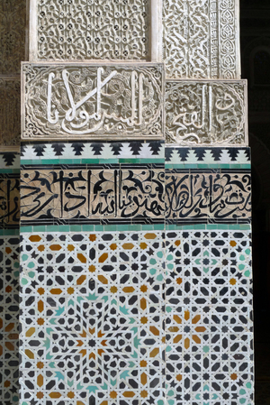 Fes (Fez), Morocco, medersa Bou Inania edifiee between 1350 and 1355 for Sultan Abu Inan Faris (Abu Inan Faris) (regne 1348-1358) during the Merinid dynasty - stucco - mosaic - zelliges - cursive writing frieze - verses from the Quran - Photo Patrice Cartier