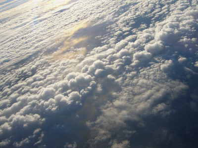 Sea of clouds: view of mountain clouds from a plane.