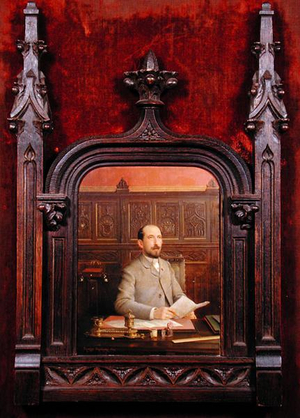 Portrait of the Artist at his Writing Desk (oil on panel in a carved wood frame)