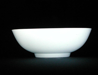 A white glazed Anhua bowl carved with dragons (ceramic)