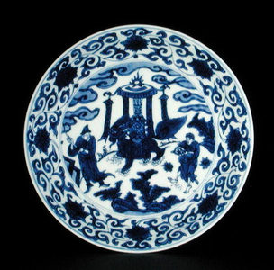 Blue and white dish painted with foreign tribute bearers and a Buddhist lion, Wanli mark and period, 1579-90 (porcelain)
