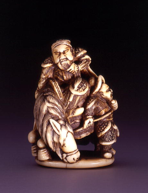 Netsuke, depicting the hero Kanu with his horse and groom, c.1700-40 (ivory) (for side view see 194411)