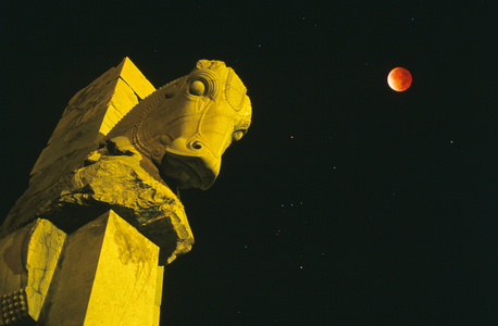 Total Eclipse of Moon, Persepolis, Iran - Lunar eclipse over Persepolis - Eclipse of Moon above the ruins of Persepolis in Iran. Lunar eclipse over Persepolis, Fars province, southen Iran