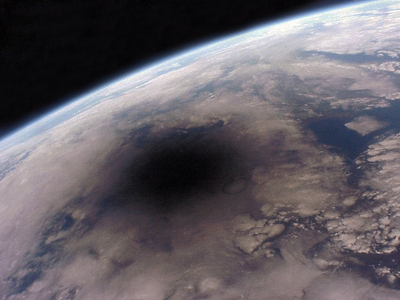 Total Eclipse of Sun - 11 - 08 - 1999 - Shadow of the Moon - 12:13 Photo of the shadow of the Moon taken by astronaut Jean - Pierre Haignere from the Mir station when he was vertical of the central massif and the black spot crossed the Channel