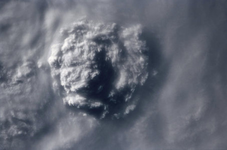Thunderstorm seen from space - Thunderstorm seen from space - Pacific Ocean storm seen from space shuttle Columbia in 2002. Thunderstorm over Pacific ocean as photographed from the space shuttle Columbia in 2002