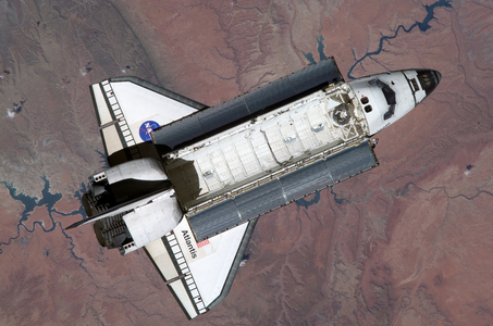 Shuttle Atlantis STS - 110 view of ISS - Atlantis seen from ISS 04/2002 - Atlantis seen over Utah after leaving the International Space Station. 17/04/2002. Atlantis flies over Lake Powell and Utah landscape not long after its separation from the International Space Station (ISS). Apr 17 2002