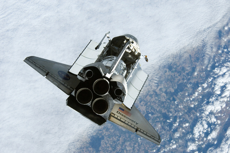 Shuttle Discovery STS - 120 view of ISS 10 - 2007 - Discovery is approaching ISS 10 - 2007 - Shuttle Discovery approaching the International Space Station. In its cargo bay, the new Harmony module (Node 2). 25 - 10 - 2007 25 Oct. 2007 Backdropped by a colorful Earth, Space Shuttle Discovery is featured in this image photographed by an Expedition 16 crewmember during a backflip maneuver performed by the approaching visitors (STS - 120) to the International Space Station