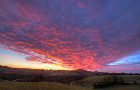 Landscape at Sunrise - Coloured clouds at sunrise - Altocumulus become red minutes before sunrise. Gers, February 2010. Sunrise in winter. February 2010, Gers, France