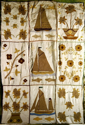 A Quilted Bed Spread of Sailing Ships and Flowers (wool on cotton)