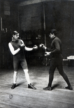 James J. Corbett (left) in a sparring session (b/w photo)