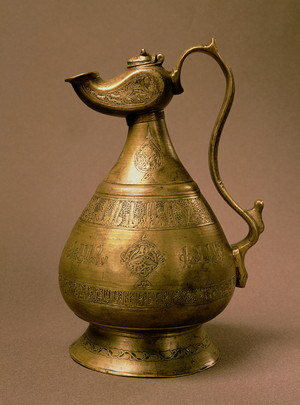 Ewer signed Ra'fa (?) Ibn Sa'ad, Khurasan, Iran, 1190 (586 Hijra) (brass inlaid with silver & red copper)