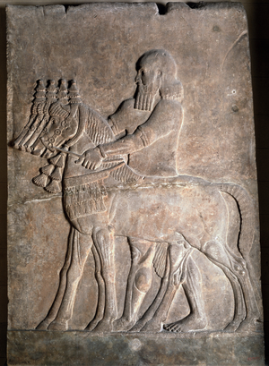 Relief of a man holding the reins of four horses, from the Palace of Sargon II (721-705 BC) at Khorsabad (Iraq) Assyrian, 8th century BC (Mosel marble)
