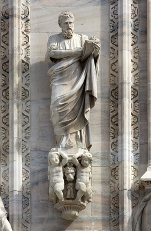 Architecture: statue of St. Mark by Donato Carabelli (1811). Detail of the facade of the Cathedral (dome or duomo) of Milan Italy