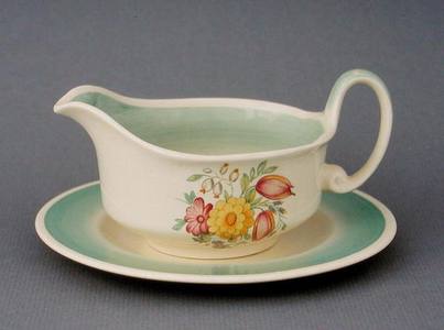 Gravy boat and saucer in 'Swansea Spray' design, 1935-50 (earthenware)