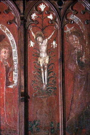 Painted panel depicting the crucifixion (photo)
