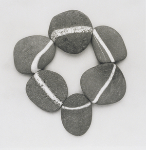 Composition of pebbles with white line