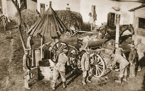 An Unnecessary Precaution: Germans testing the water in a Serbian Village well, from 'The Illustrated War News', 1916 (sepia photo)