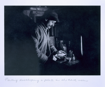 Ponting developing a plate in the dark room, from 'Scott's Last Expedition' (b/w photo)