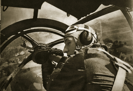 Observer in the pivotable machine-gun post in a German fighter plane, 1939 (b/w photo)