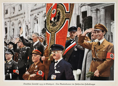 German Gymnastic Tournament 1933 in Stuttgart, the National Banner with Sign of the Swastika, from 'Germany Awakened' (colour litho)