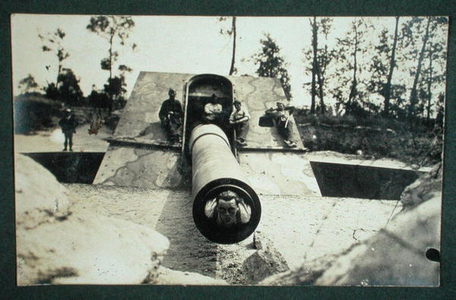 Civilians posing on a Cannon, from an album of photographs documenting the War on the Western Front, c.1914-18 (b/w photo)