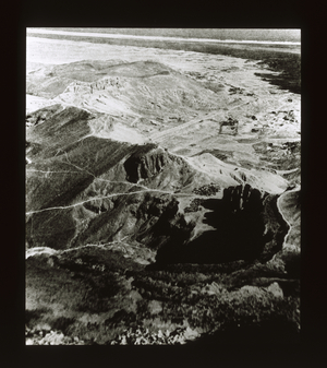View of the site of the Temples at Deir El-Bahri (lantern slide)