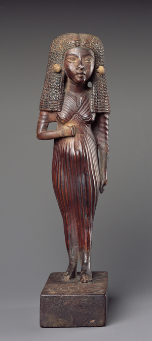Statuette of the Lady Mi standing, from Medinet Ghurab, Amarna Period, New Kingdom (wood)