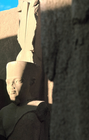 Luxor Thebes: Right bank of the Nile. Temple of Amon in Karnak. The God AMON under the traits of Tutankhamun, 18th Dynasty.