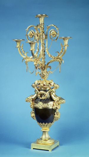 F132 Louis XVI Candelabra with gilt bronze branches rising out of a classical vase with handles in the form of female fauns