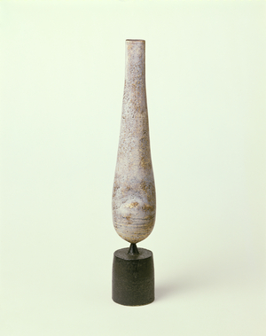 Standing form on black cylindrical base, 1975 (stoneware)