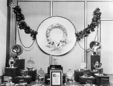 Redding, California: c. 1926 - A window display by George Hauber at the McCormick-Saeltzer department store for Christmas gifts of, ""Electrical Appliances: Sturdy Substantial Gifts That Are Always Desirable"".