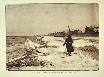 Soldier on patrol along the beach in winter at Nieuwpoort in Flanders during the First World War, Belgium
